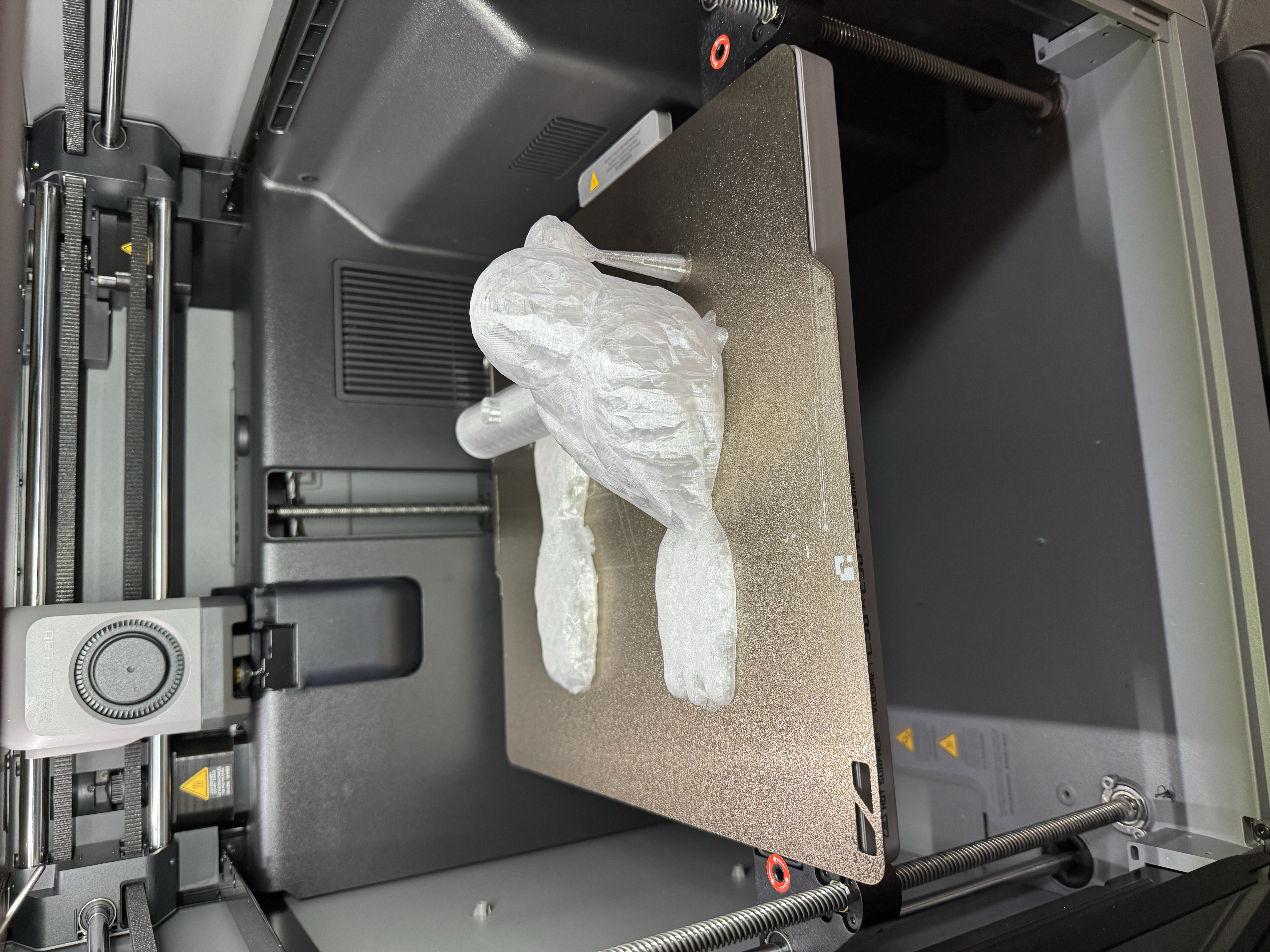 First white PETG Phoebe bird print on the Bambu Labs build plate